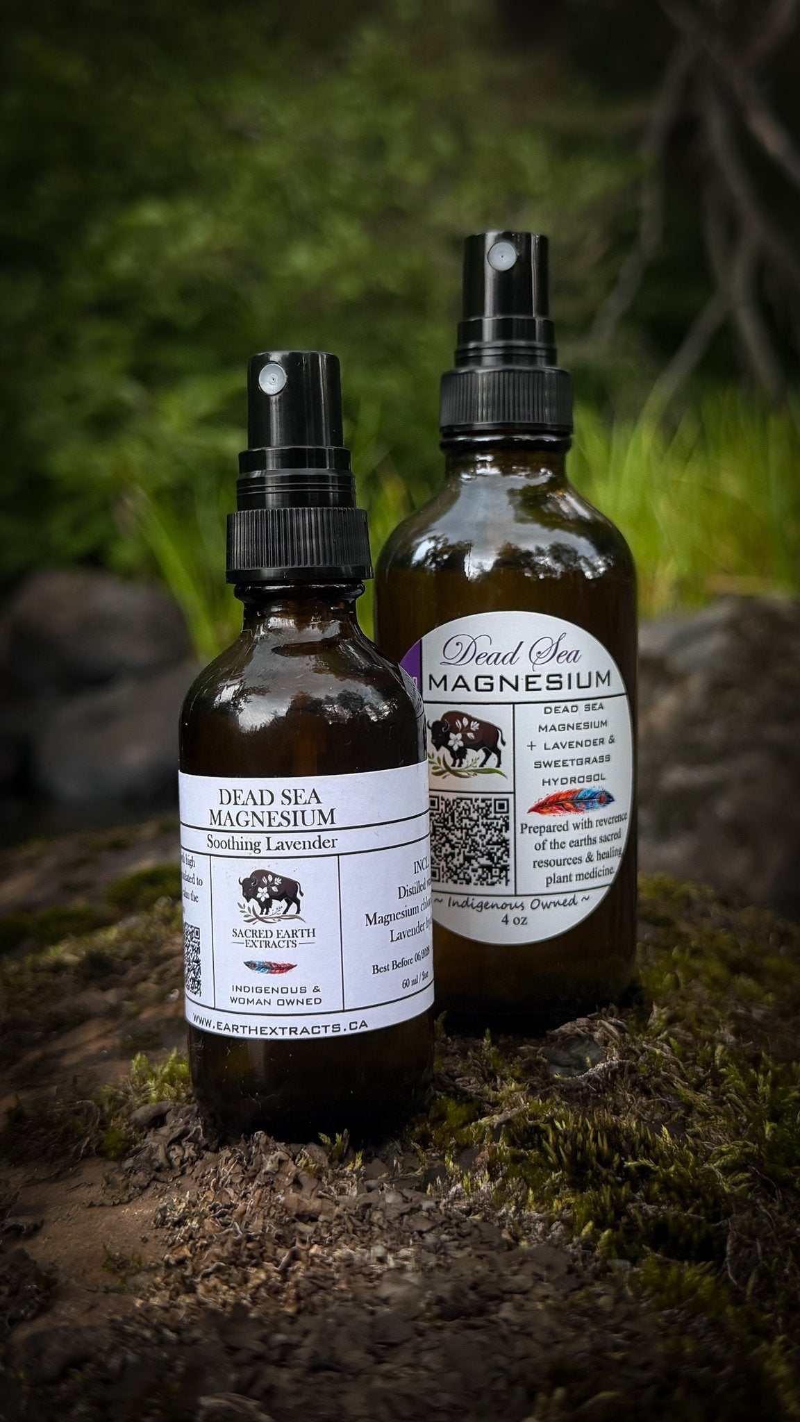 Dead Sea Magnesium spray in two sizes on a mossy rock