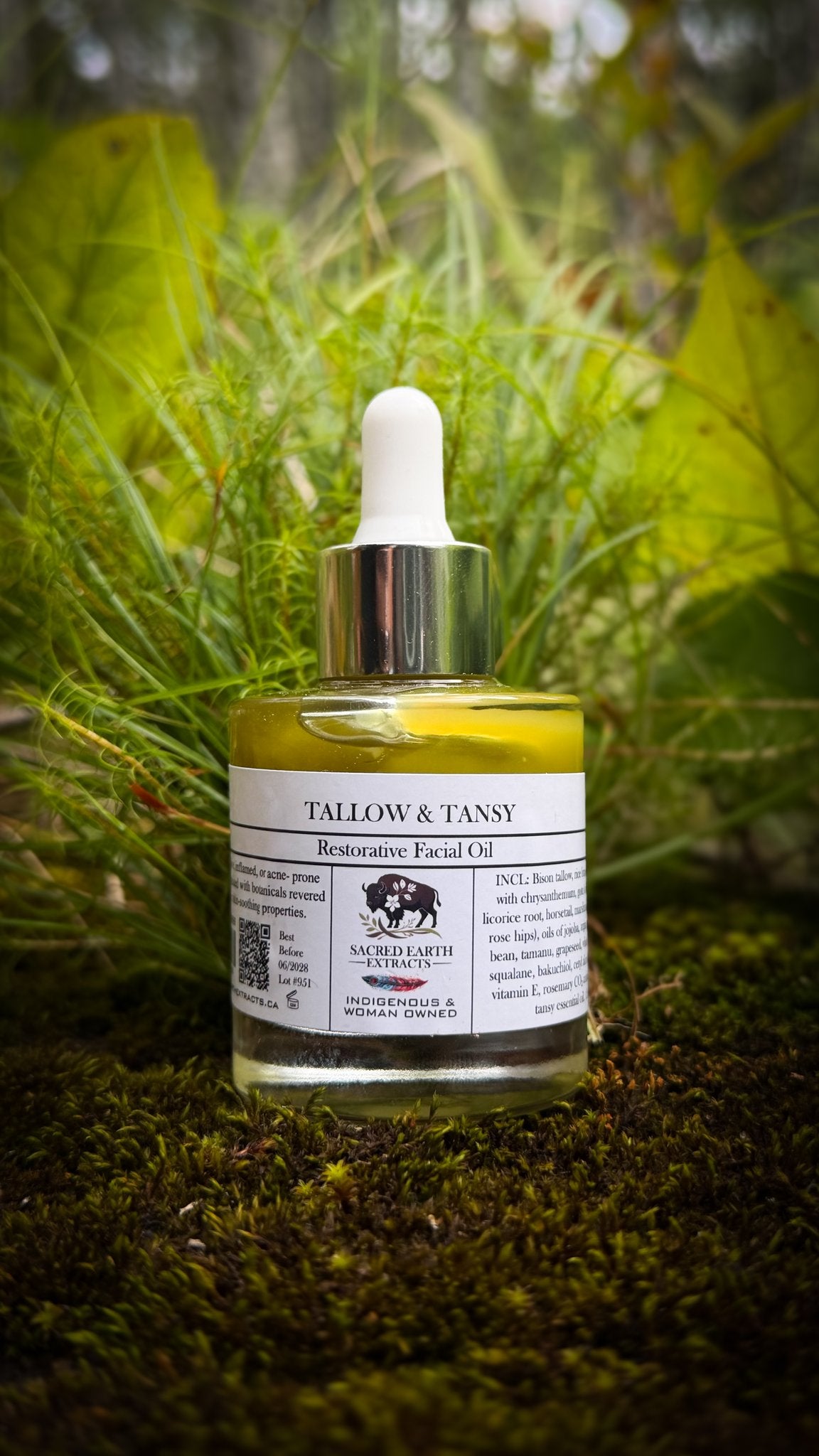 Tallow and Tansy facial oil in the grass